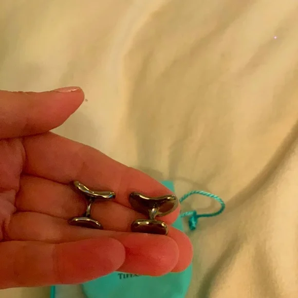 Authentic brand new Tiffany cufflinks with pouch.Rare and limited edition. Must!